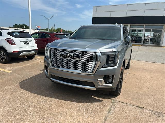 2023 GMC Yukon Denali in Sterling Metallic — front three-quarter view