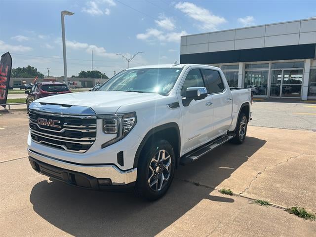 2025 GMC Sierra 1500 SLT in Summit White — front three-quarter view