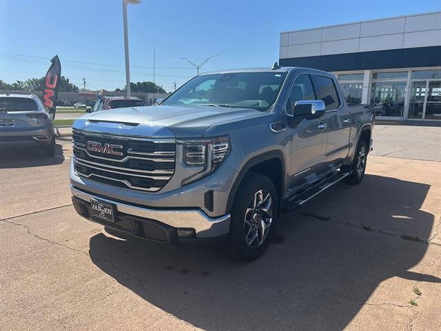 2026 GMC Sierra 1500 SLT in Sterling Metallic — front three-quarter view