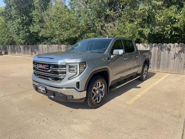 2026 GMC Sierra 1500 SLT in Sterling Metallic — front three-quarter view